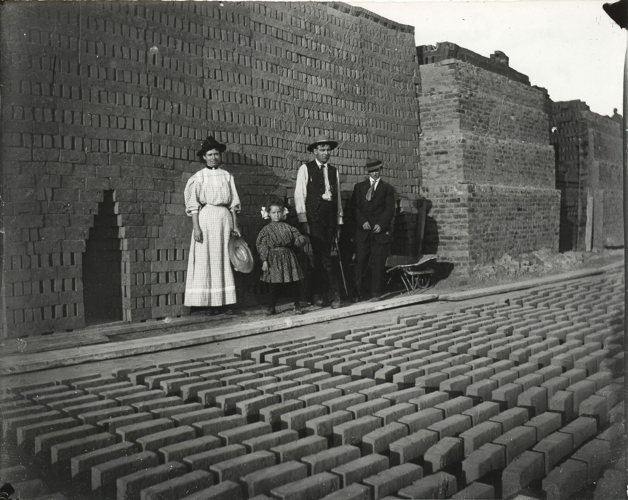 Brick making was often a family business that included children, parents, and maybe a hired hand or two. Sun-dried bricks were stacked, 20,000-50,000 at a time, creating their own kiln. Plastered with mud to limit air, a fire was kindled and carefully monitored to harden bricks.  (1)