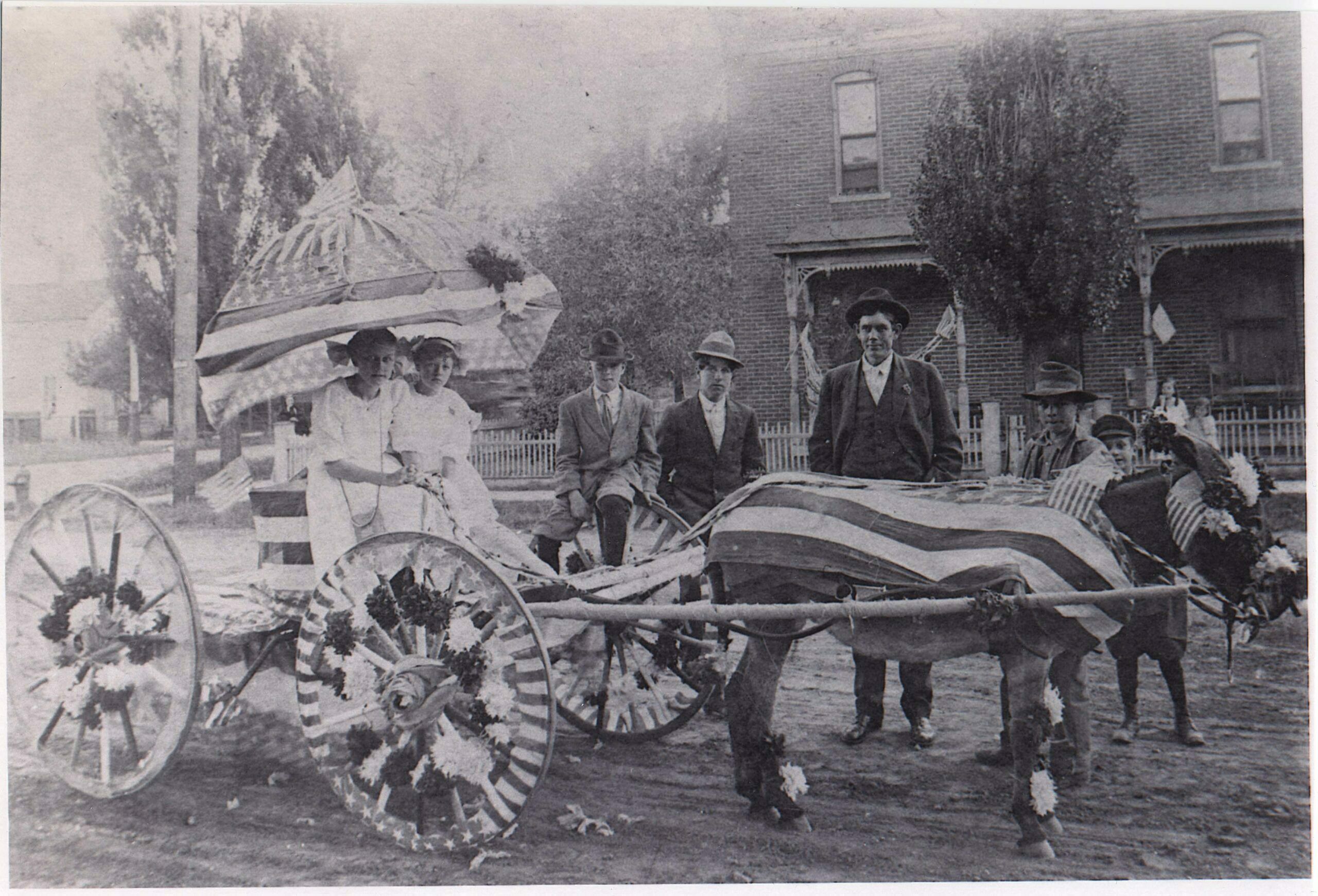 Francis Haley King, on the left side of the buggy seat, and her unidentified companion, won second place in the children’s float contest for their entry in the July 4 parade. The decorations seem to have held together remarkably well considering the parade route ran 12 blocks up F Street, turned right on Twelfth before returning to First Street on G. It was touted then as the longest parade in Salida history.  (1)