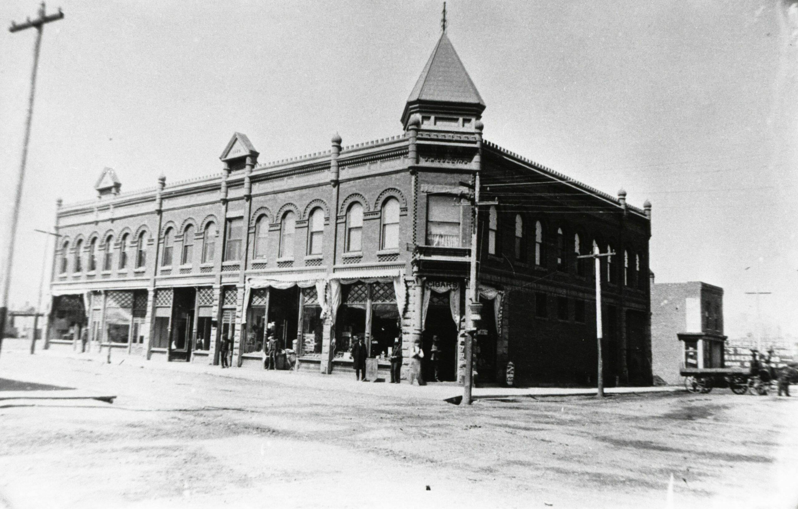 Built after the 1888 fire, the J.M. Collins building at the corner of West Second and F Streets was one of the most impressive in the downtown district. The two segments at the right were razed in the 1980’s to make room for a parking lot.  (1)