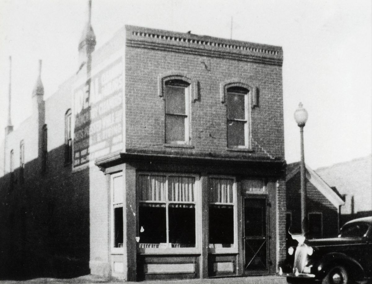 This is 117 W. 2nd Street in Salida. This building is no longer standing. The current location is in the parking lot of Pueblo Bank and Trust and was probably the place of business of William W. Roller, whose specialty included real estate, rental properties, and loans.