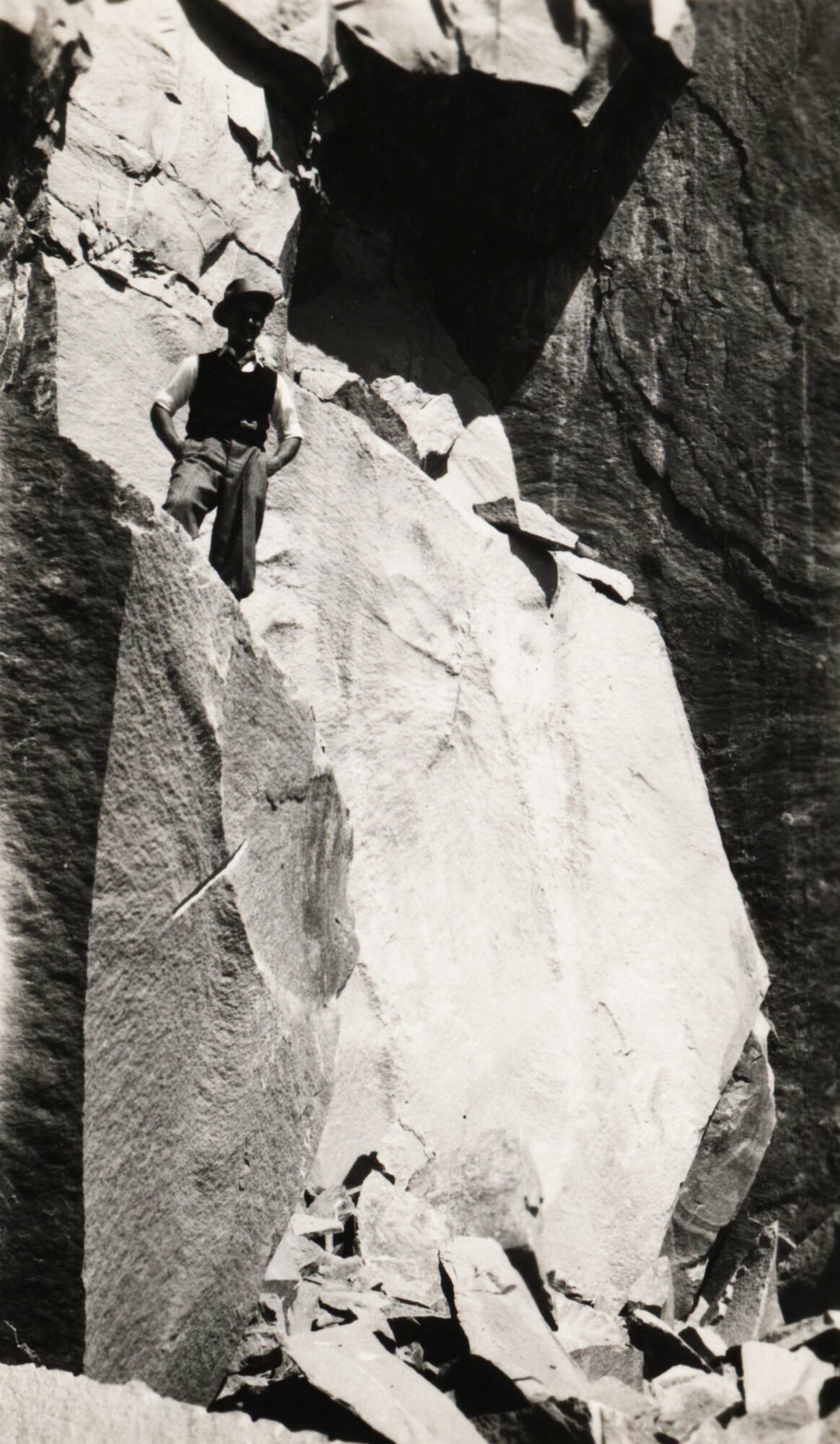 Salida Granite Company man posing with granite slab.JBlouchColl